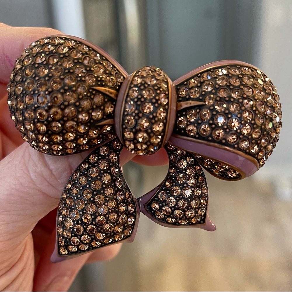 Joan Rivers crystal ribbon bow, pink lavender on brown